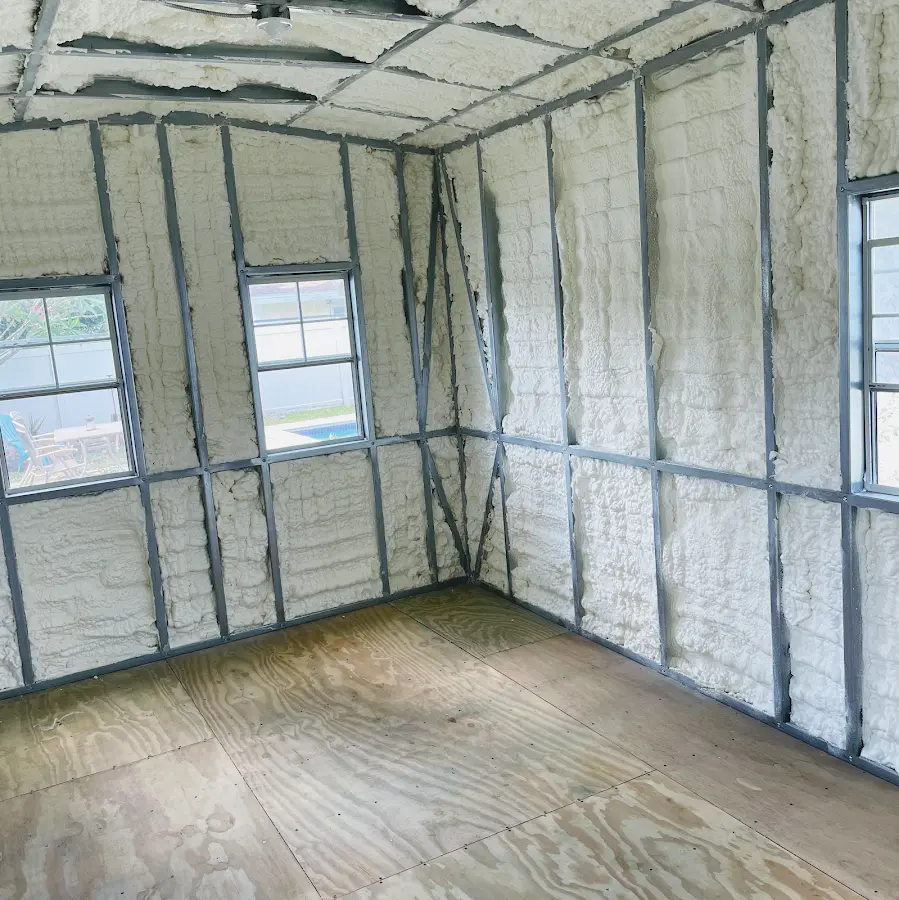 Closed-cell spray foam insulation applied to wall cavities in a residential project in Athol
